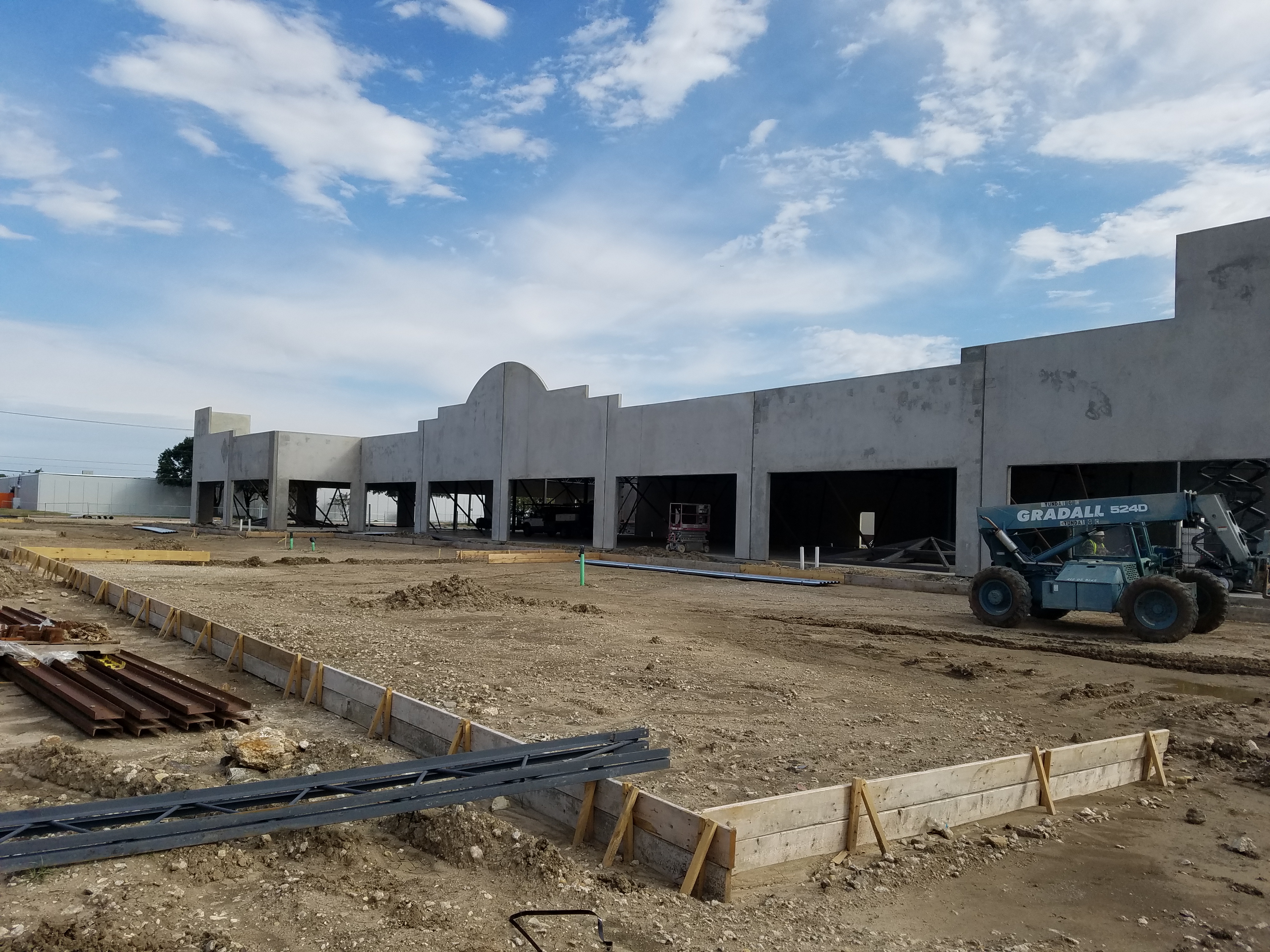 Retail center facade and storefront openings during construction