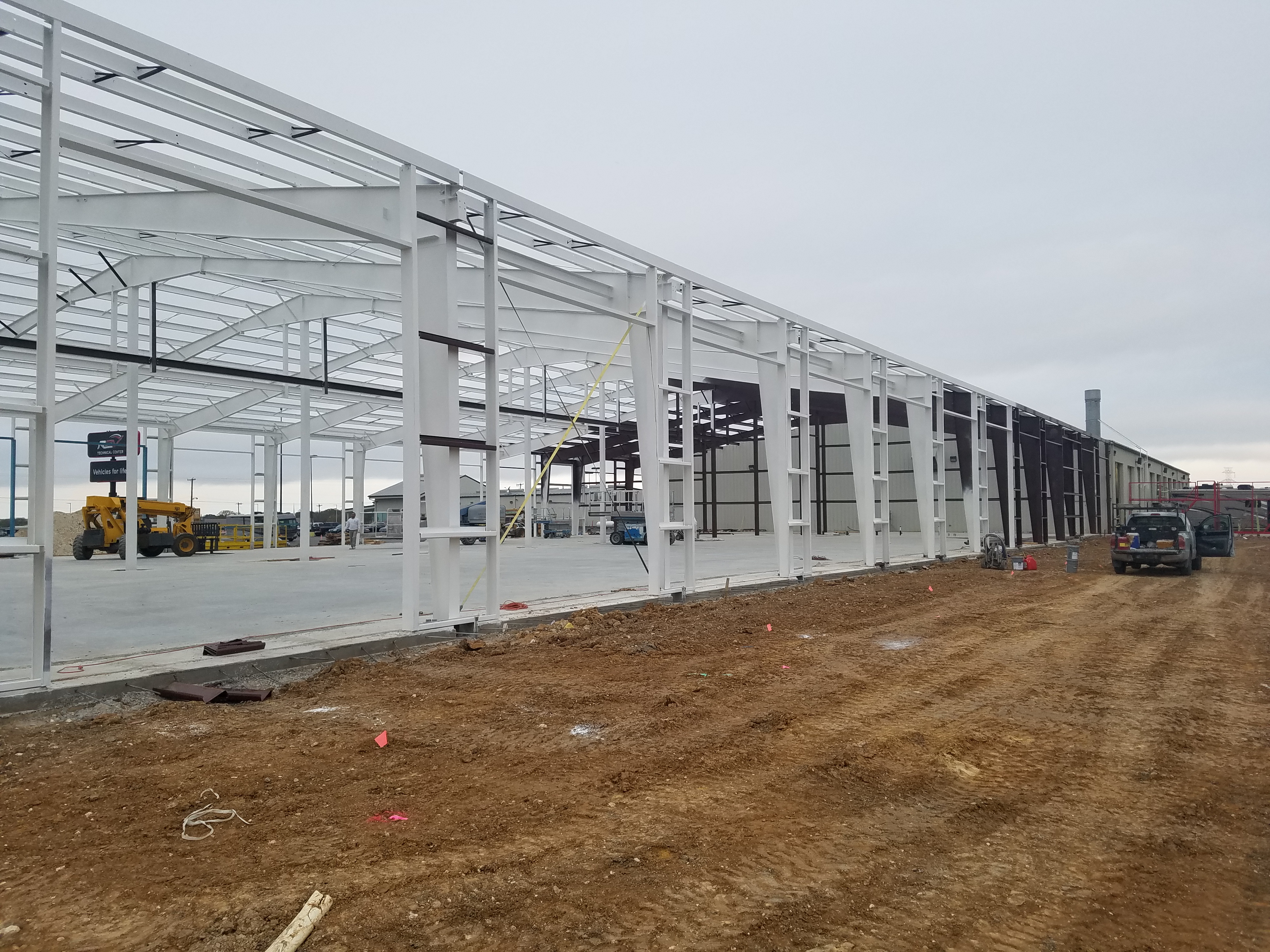 Side view of the Cedar Hill State Park steel building under construction