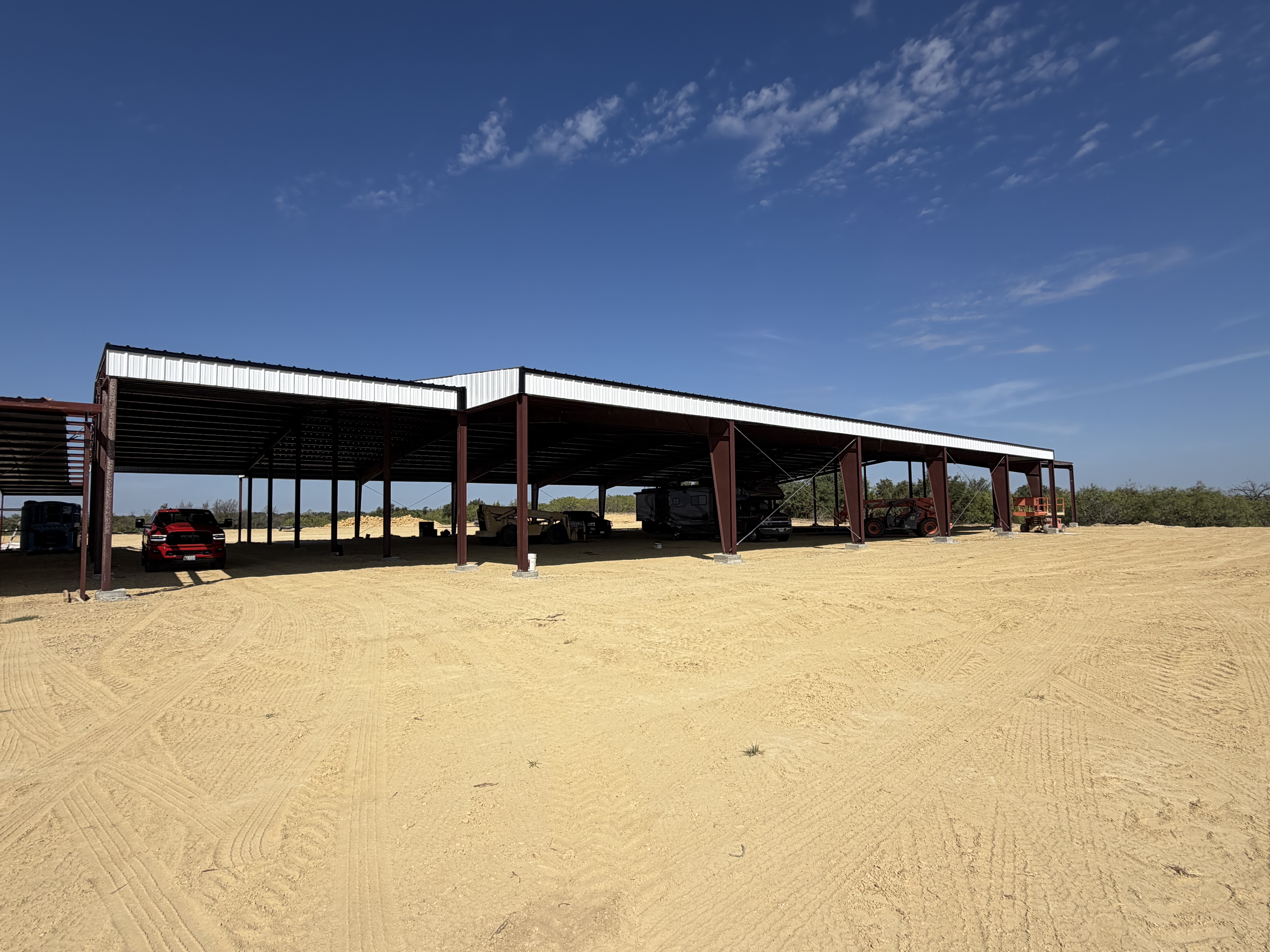View of the horse riding arena exterior frame under construction