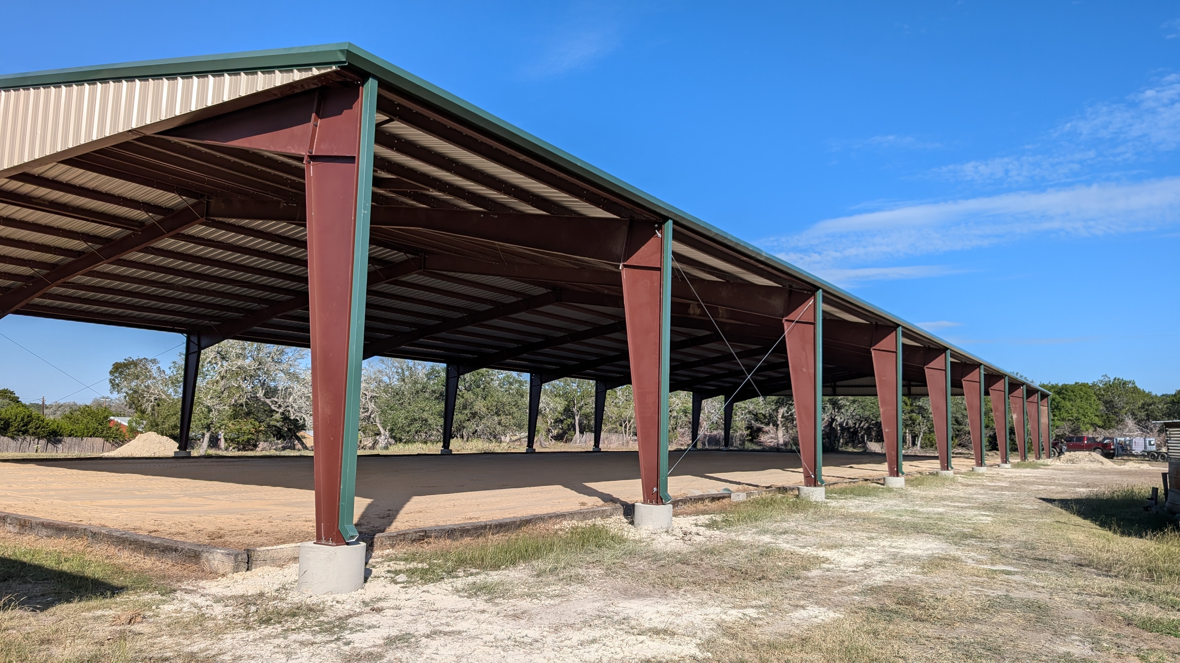 Exterior view of a covered horse arena in Boerne, Texas